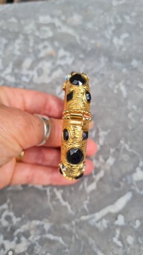 Bracelet jonc vintage signé Sphinx , serti de pierres noir et brillant - doré K 57 années 80