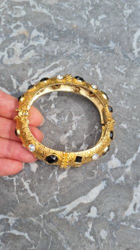 Bracelet jonc vintage signé Sphinx , serti de pierres noir et brillant - doré K 57 années 80