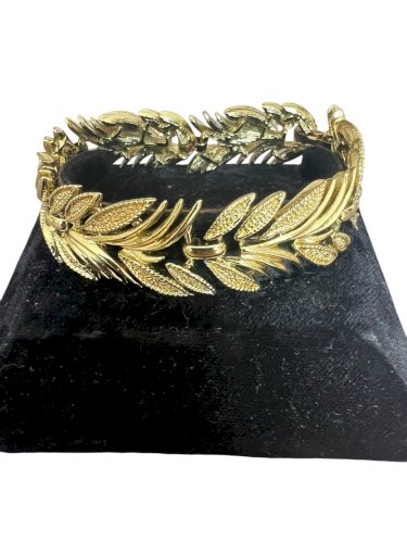 Bracelet vintage vers 1950 travail américain doré feuillage rétro chic élégant