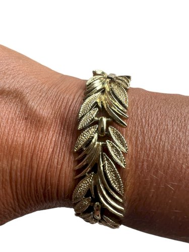 Bracelet vintage vers 1950 travail américain doré feuillage rétro chic élégant