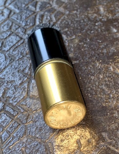 Briquet publicitaire féminin tube à essence vintage 1960's meules Norton Paris