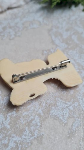 Broche ancien buste une femme africaine en matière noble