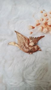 Antique bird brooch