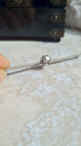 Antique silver brooch with a solitaire
