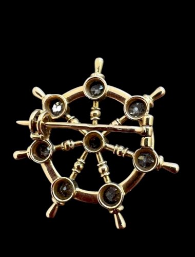Broche ancienne or 18 Kt poinçon Aigle diamants roue Gouvernail Voyage unisexe