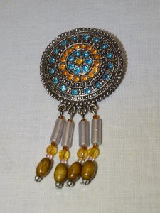 -VINTAGE FANTASY BROOCH with BLUE & ORANGE CABOCHONS & 4 CHARMS D