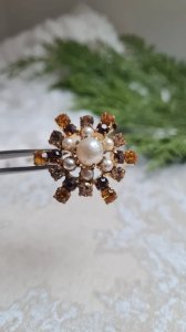 Vintage brooch with champagne rhinestones