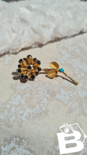 Broche vintage fleur avec des strass fabriquée en Autriche