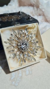 Vintage oversized brooch sold in its box.