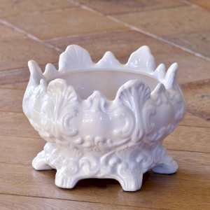 Antique cache-pot, 19th century from 1873, in faience with baroque decoration.