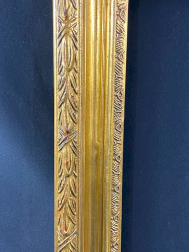 Cadre en bois doré de style Louis XVI