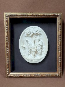 GLASS FRAME WITH A LIMESTONE RELIGIOUS SCENE SIGNED BLOCH