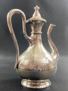 19th century silver-plated coffee pot with rich guilloché decoration from the Napoleon III era.