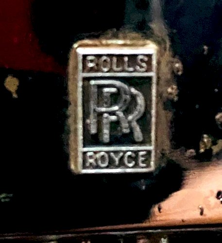 Calandre de ROLLS  ROYCE en gourde a wisky et boite a musique XX siècle