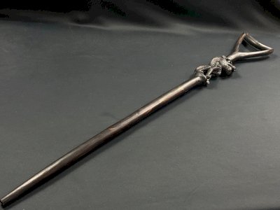 Makonde ceremonial cane from Tanzania in carved ebony with a lion.