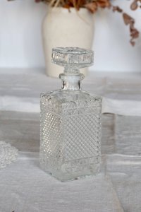 Vintage pressed glass whiskey decanter – Engraved flower stopper