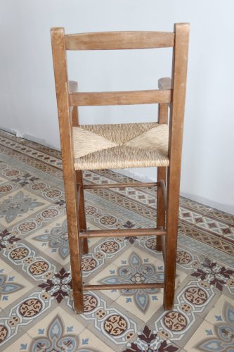 Chaise haute enfant vintage en bois et assise paillée