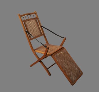 19th-century colonial-style caned chaise longue