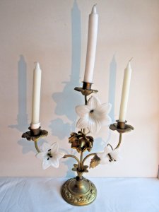 Brass church chandelier and white porcelain lilies, early 20th century.