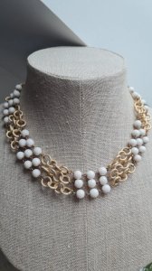 Antique necklace with 3 strands of porcelain pearls.
