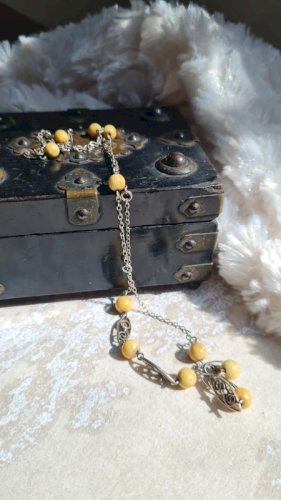 collier ancien filigrane en argent et matière noble