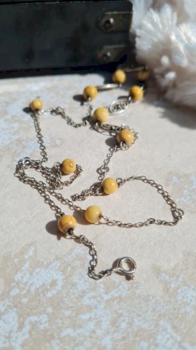 collier ancien filigrane en argent et matière noble