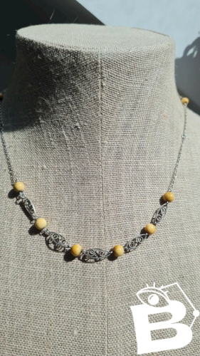 collier ancien filigrane en argent et matière noble