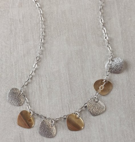 Collier avec pendentifs en argent massif et vermeil
