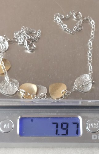 Collier avec pendentifs en argent massif et vermeil