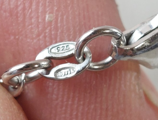 Collier avec pendentifs en argent massif et vermeil