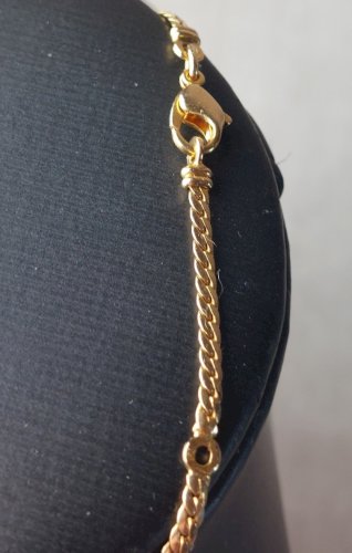 Collier décor éléphant, en plaqué or ^