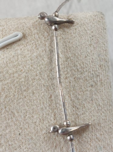 Collier en argent, décor oiseaux