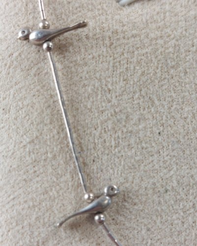 Collier en argent, décor oiseaux