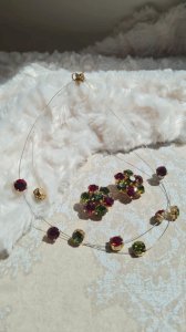 Necklace and earrings signed Dominique. A - red and green rhinestones.