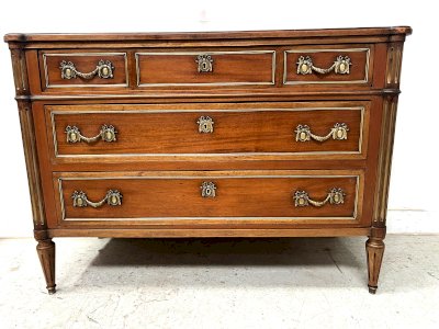 Louis XVI style mahogany chest of drawers with gray veined marble top, 19th century.