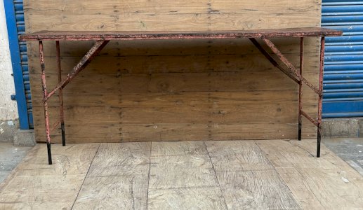 Folding metal workshop console with original patina.