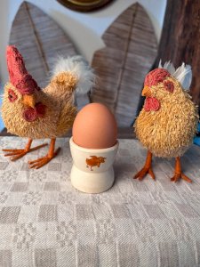 Antique earthenware egg cup devil