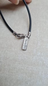 Yves Saint Laurent 925 silver neck cord.