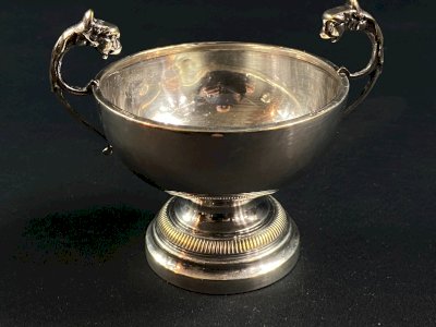 Silver-plated handle cup on a foot in Louis XVI style.