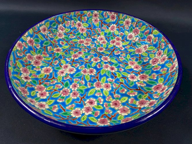 Coupe creuse circulaire en faïence émaillée de Longwy