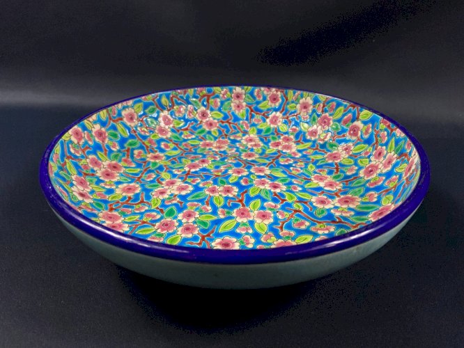 Coupe creuse circulaire en faïence émaillée de Longwy