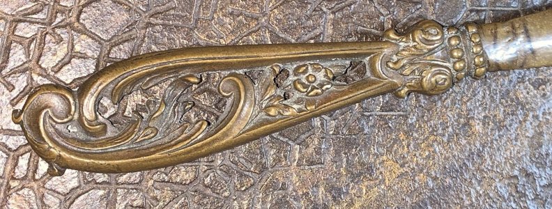 bronze paper cutter in Rococo style from the 19th century