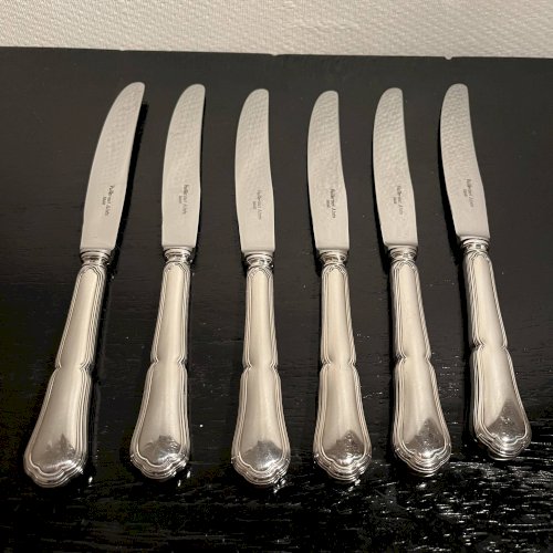 Couteaux en métal argenté