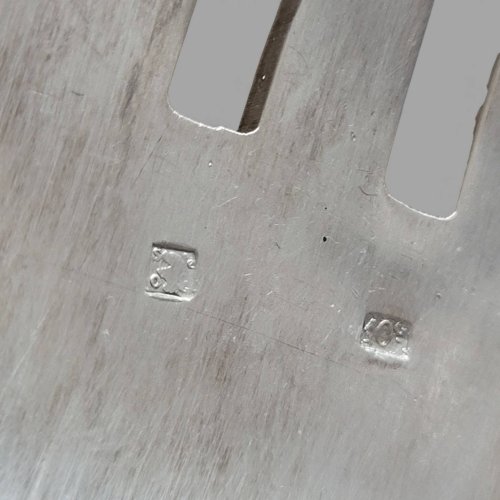 Couverts de service en métal argenté