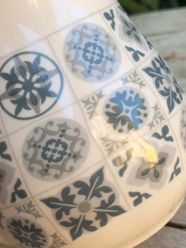 Crémier motifs géométriques gris et turquoise