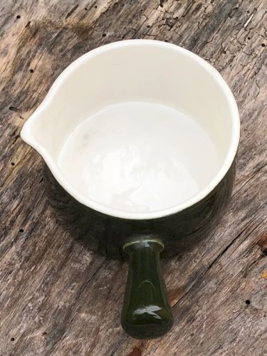 Crémier vintage en faïence vert foncé