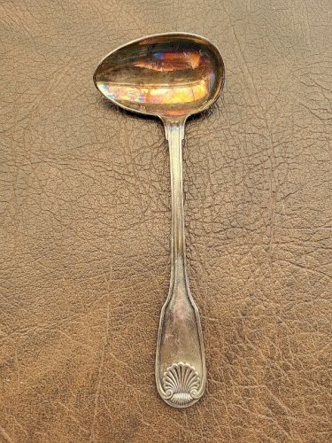 CUILLERE DE BEBE CHRISTOFLE EN METAL ARGENTE MODELE COQUILLE