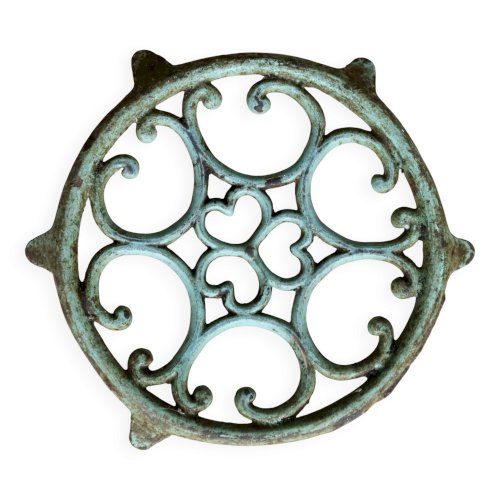 Dessous de plat ancien rond en fonte turquoise ajourée