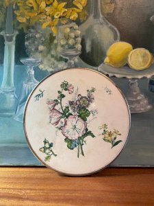 Antique iron earth trivet