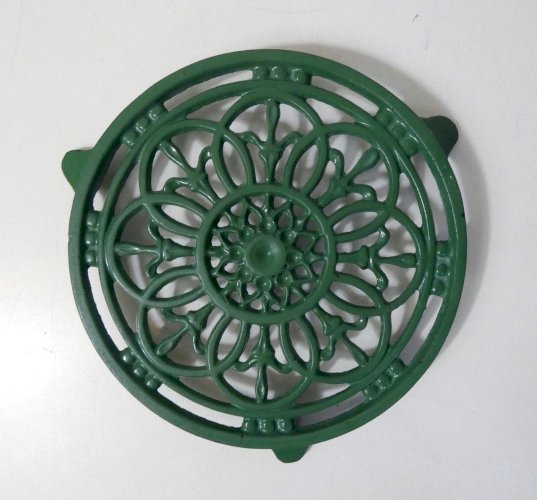 dessous de plat vert en fonte vintage